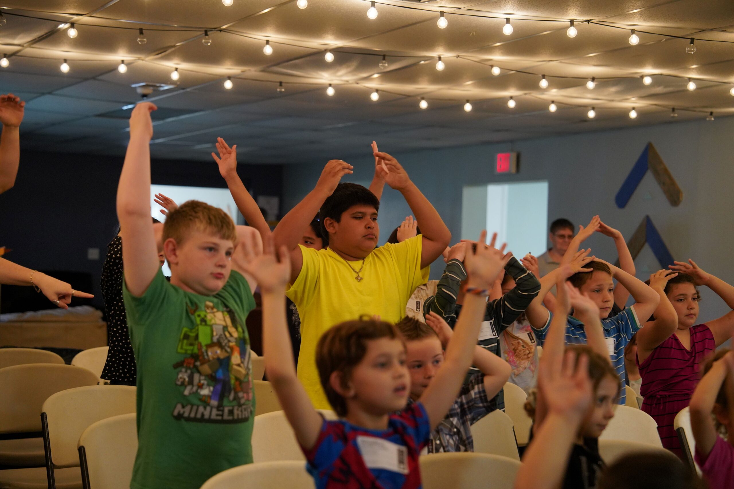 Children gathered together and engaged during Bethany Kids