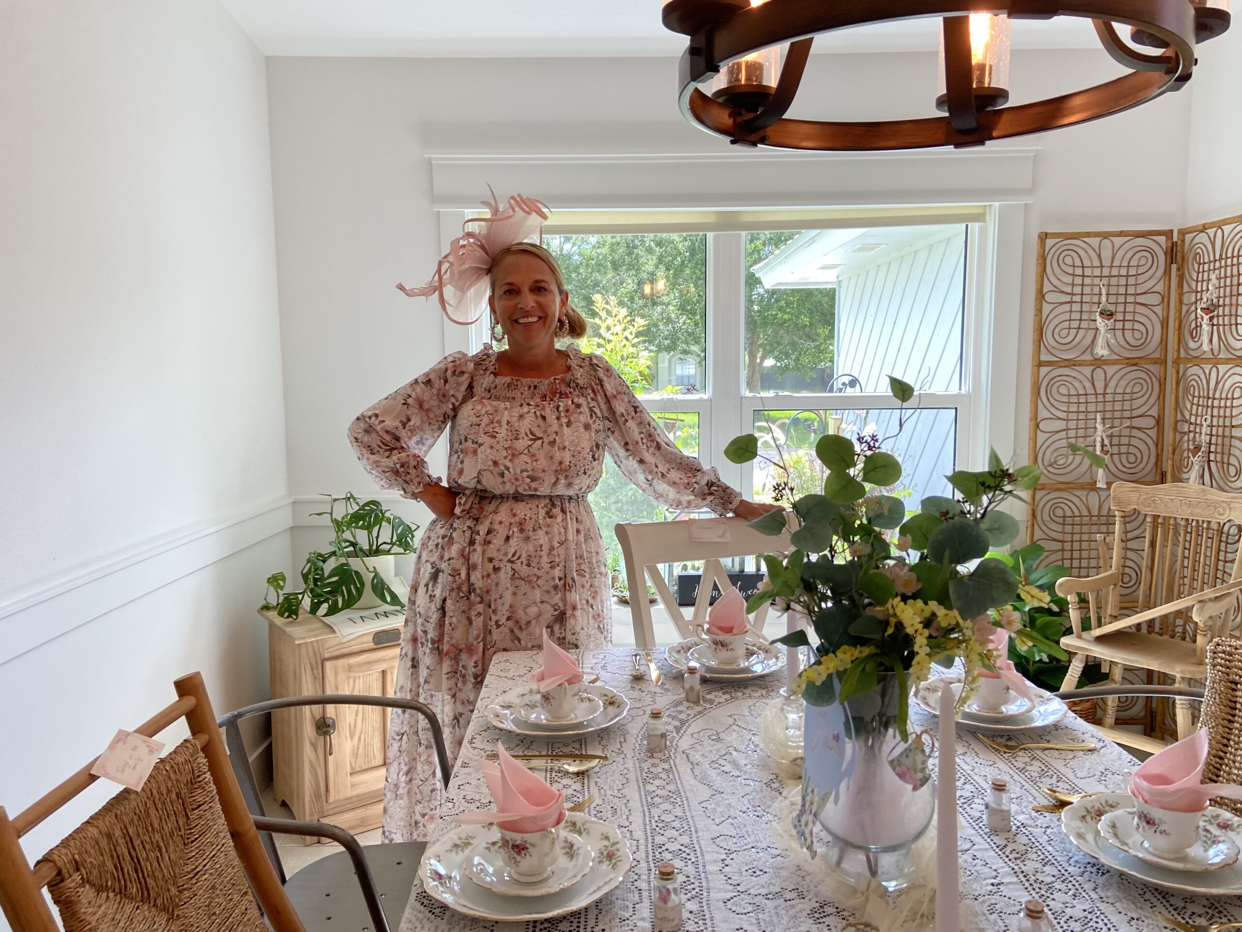 Tea-themed Bethany Ladies table setting with floral china and event decor