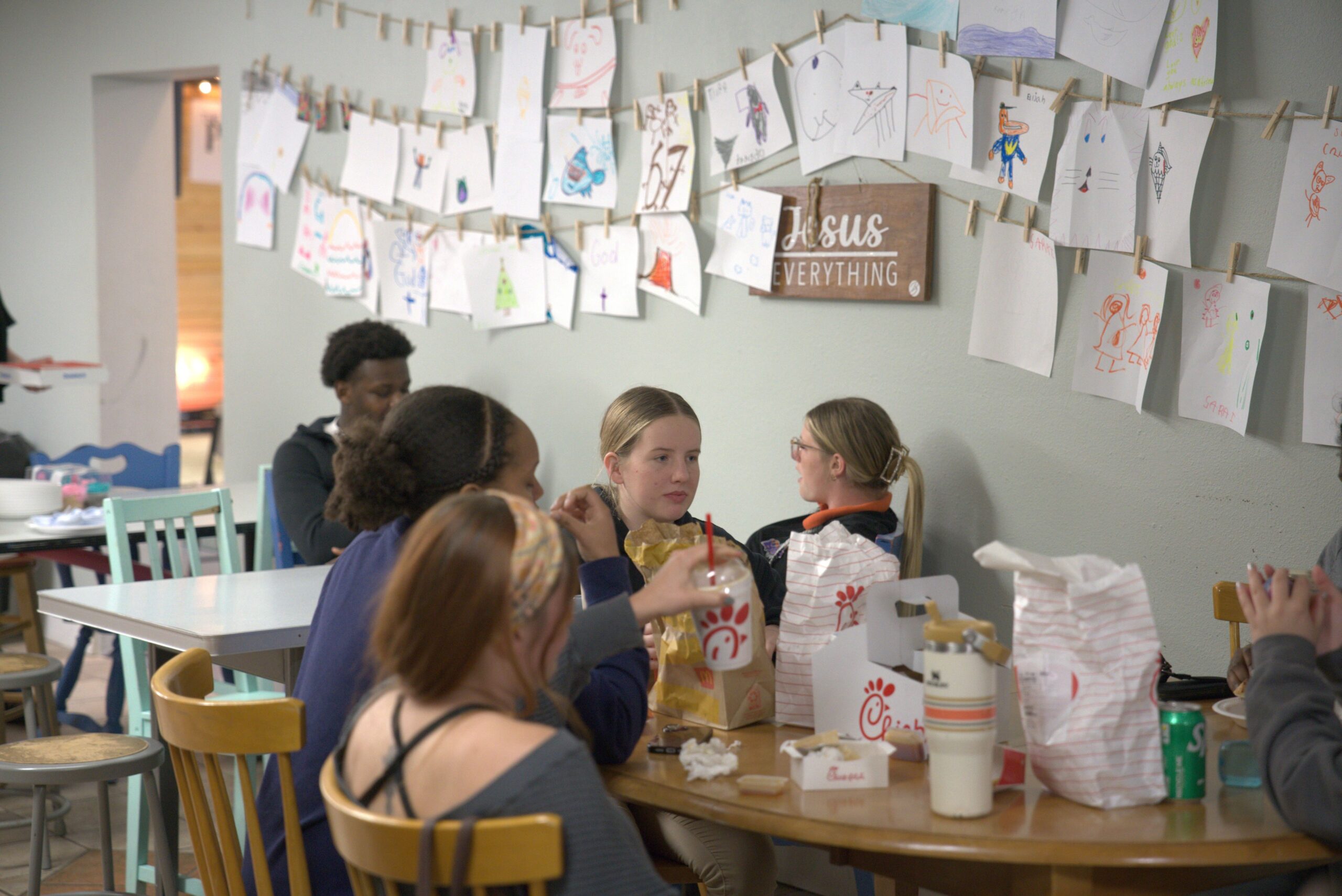 Bethany Youth students spending time together in the ministry space before service