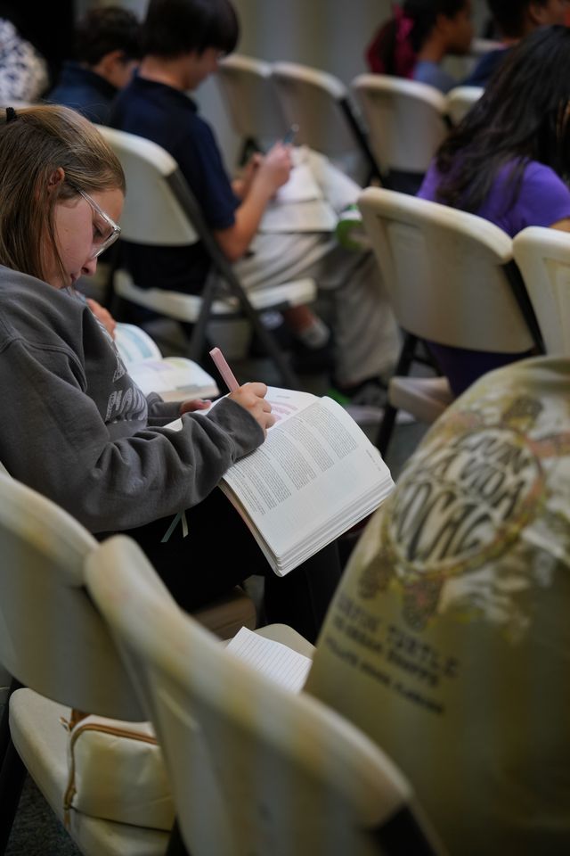 Bethany Youth students sharing a meal and talking together in a relaxed ministry setting