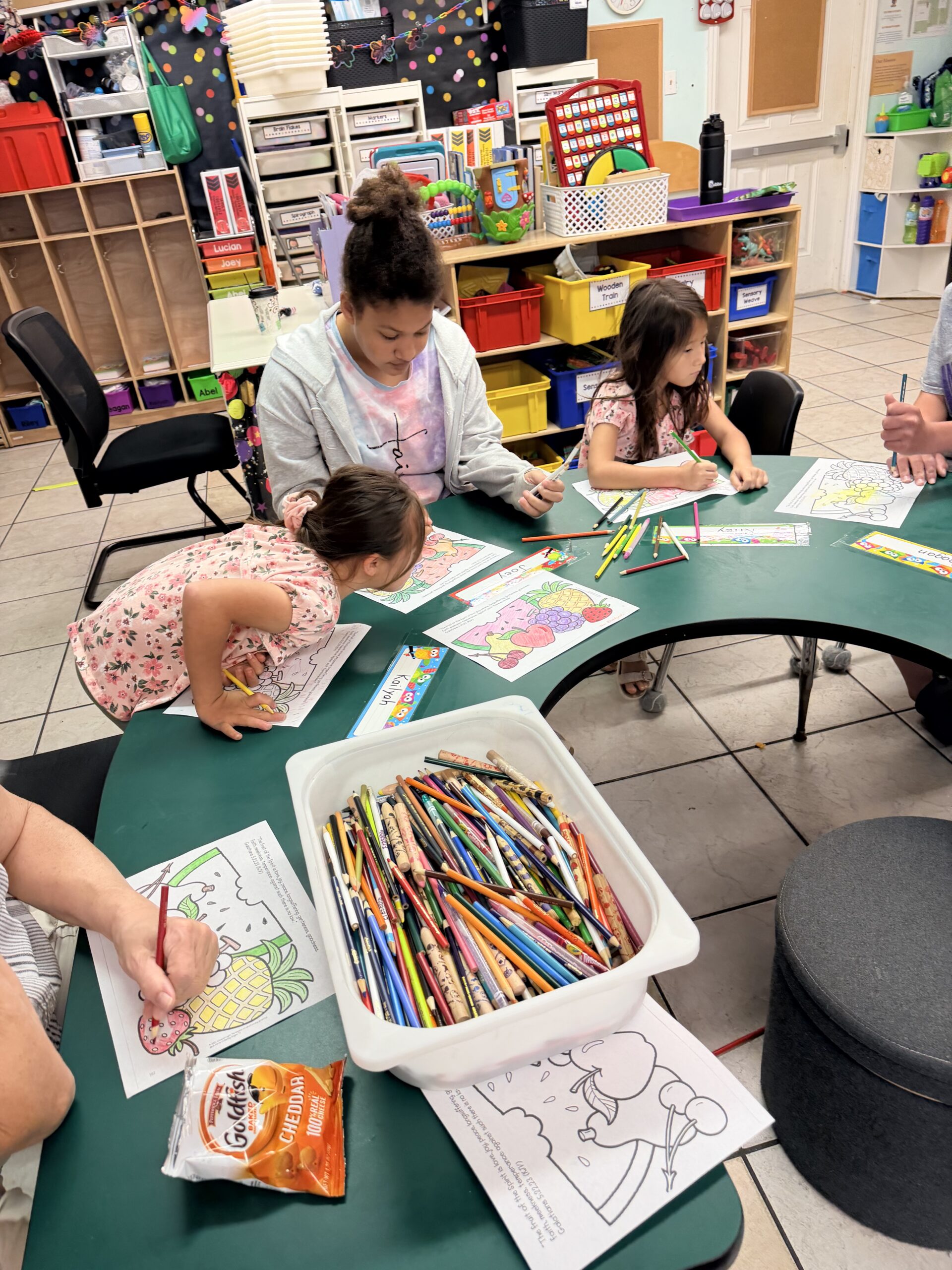 Children and volunteer working together in SONbeams ministry classroom at Bethany Church Florida