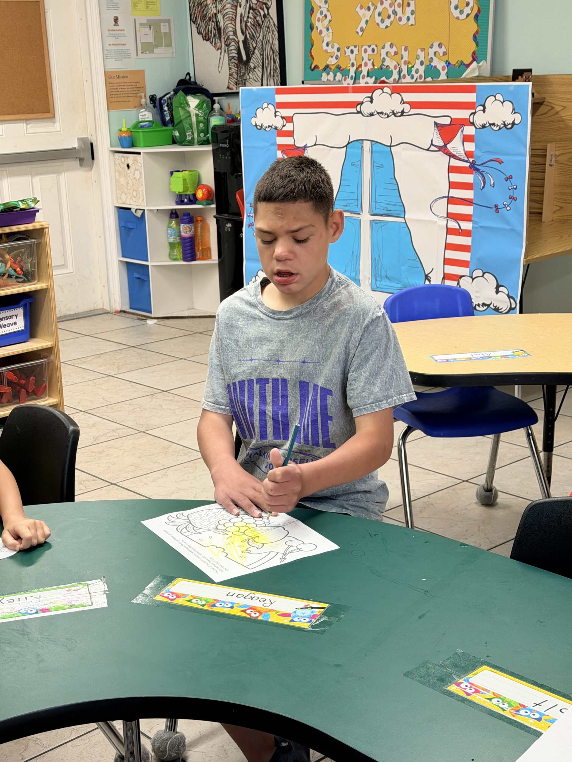 Student focused on coloring activity in SONbeams classroom at Bethany Church West Melbourne FL